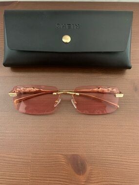Rimless Pink Sunglasses with Gold Frame